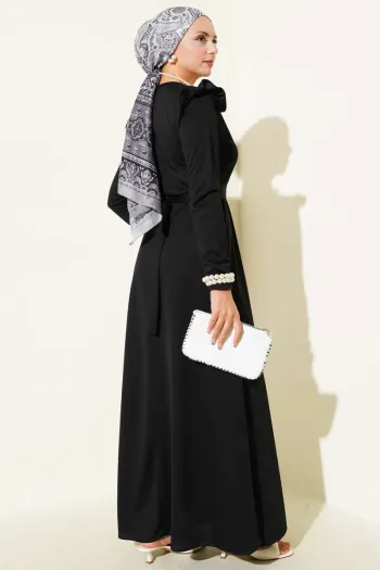 Black Dress with Ruffle Shoulder Detail and Belt