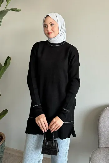 سترة صوفية سوداء بسيطة مزودة بتفاصيل أنيقة