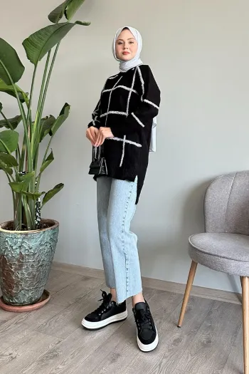 Black knitted blouse with white shiny stripes